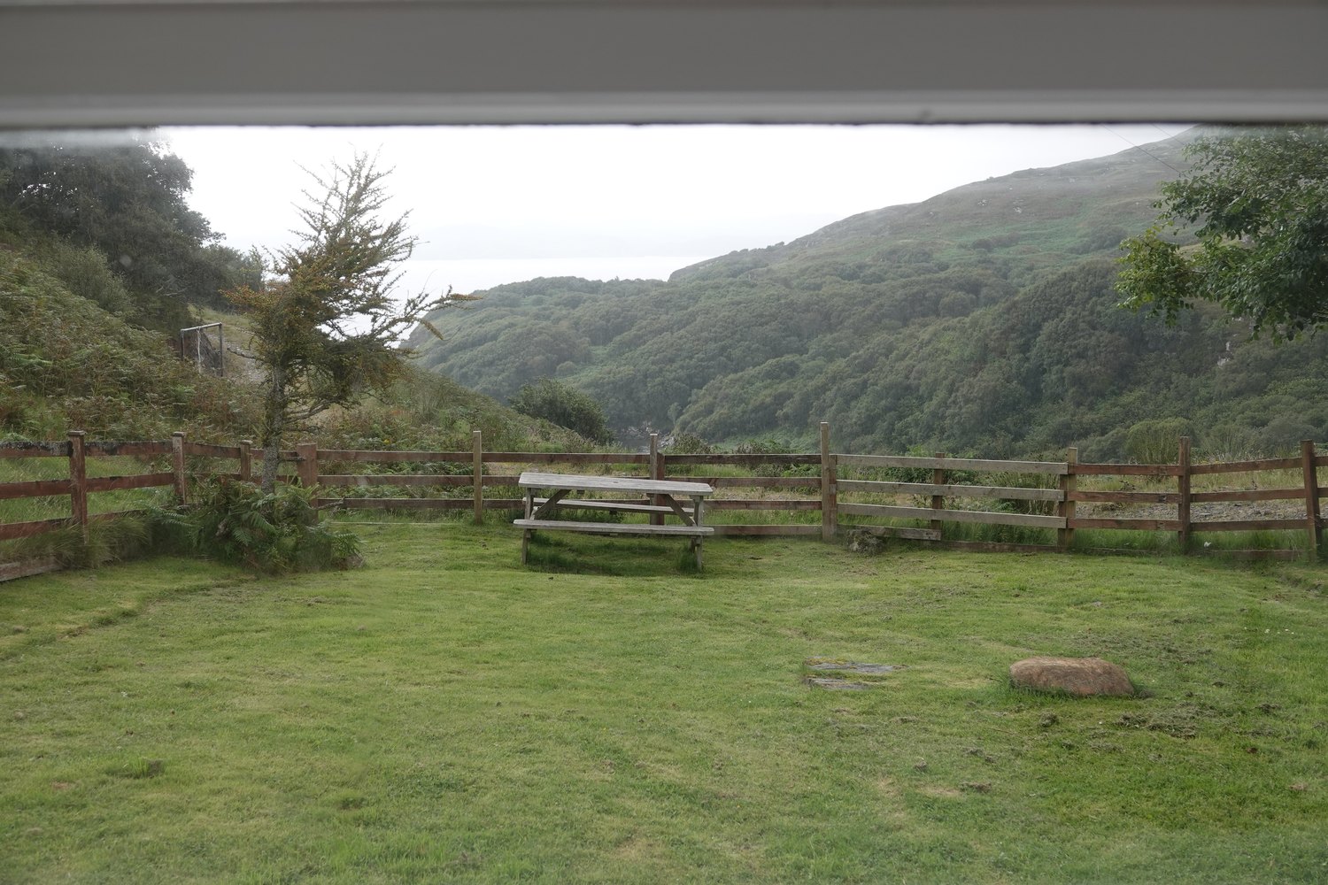 Garden and wooded coastal view from Torbeg Cottage in Drumbeg